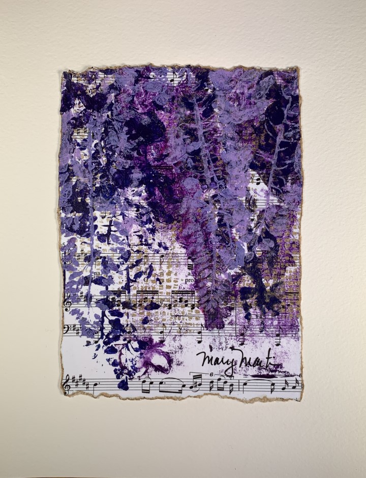 collage with wisteria blooms in foreground and sheet music to the Schubert Ave Maria in the background